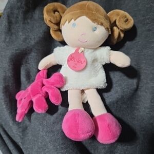Brown and Pink Stuffed Doll